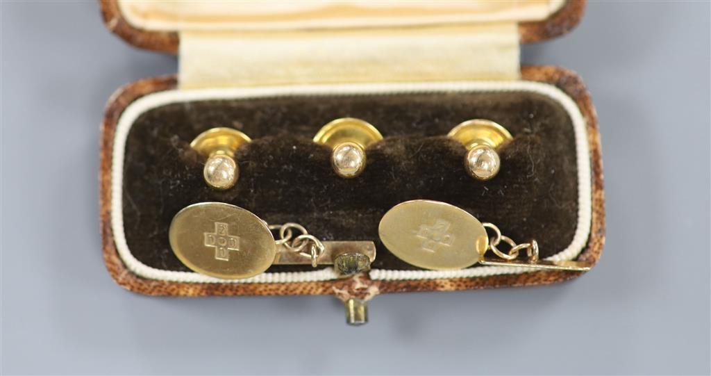 A pair of 9ct gold Millennium oval cufflinks and three cased 9ct gold dress studs, gross 3.6 grams.